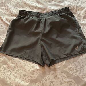 Asics women’s running shorts in olive green